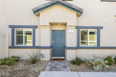 Doorway to property with stucco siding