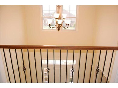 Exterior Front. Stunning rod iron spindles can be found throughout this home!