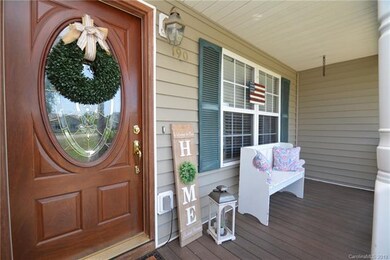 Enjoy quiet mornings spent on your covered Front p