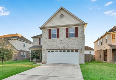 Here's another view of your beautiful new home with a beautiful brick exterior.