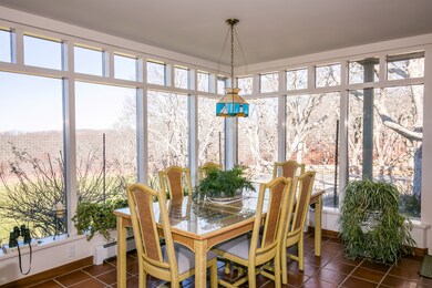 Dining room off the kitchen with waterviews