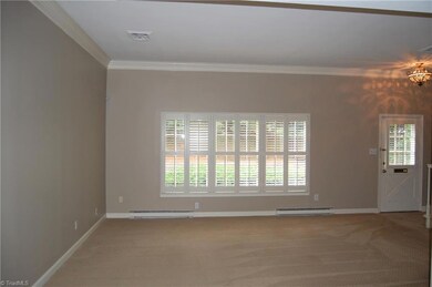 Living Room opens to Private Parking Area
