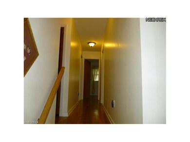 Steps up to bedrooms.