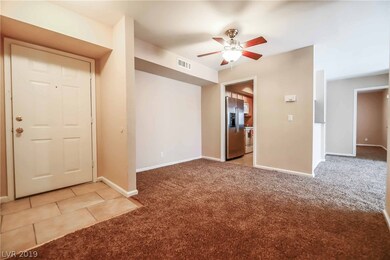 FRONT ENTRY*VIEW TO DINING ROOM, KITCHEN & FAMILY