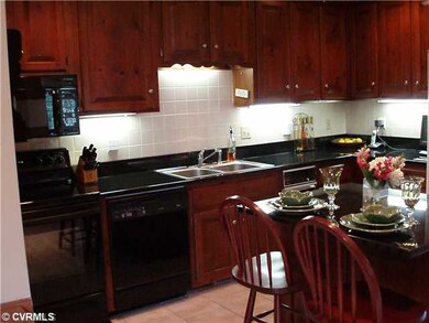 Kitchen - GRANITE WITH BLACK APPLIANCES AND CERAMI