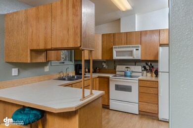 Kitchen w/Breakfast Bar & Laminate Floor