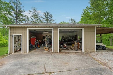 Garage featuring a detached garage