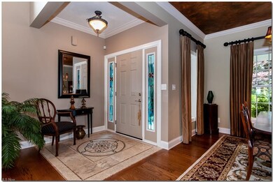 AN INTRICATE MOSAIC TILED ENTRYWAY GREETS YOU UPON