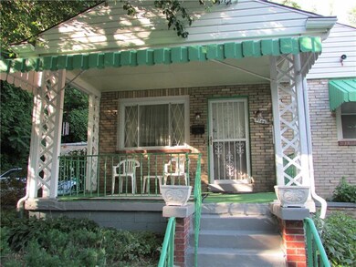 Enjoy cool breezes on the freshly painted covered 