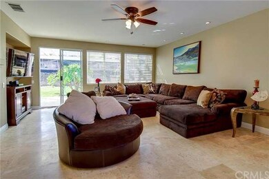Spacious Family Room with Travertine flooring~exit