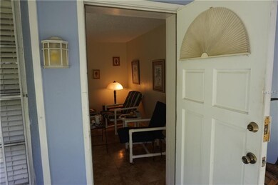 Front door leading into the living room