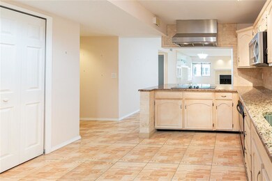 Kitchen opens to Living/Dining Combination w/ view