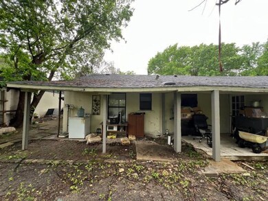 Rear view of house with a patio area