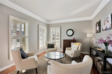 Living Room off Foyer with plantation shutters on