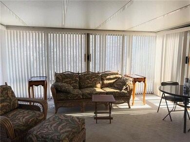 A SPECIAL EXTRA SUNROOM THAT ENHANCES THIS HOME