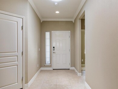 Tiled entryway with ornamental molding