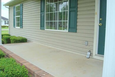The front porch is large enough for a couple of rocking chairs