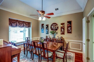 What a gorgeous dining room with hardwood floors, 