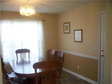 Formal Dining with a view of the Huge Privacy Fenced Backyard!