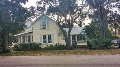 East side of house on Riverview Dr