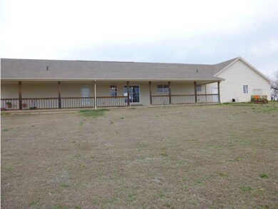 The back covered patio is also the length of the h