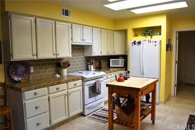 More than ample cabinetry and counter space, and n