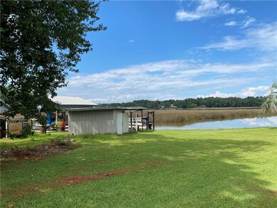 View of yard with a water view