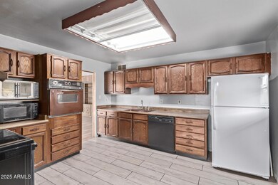 3823 W Berridge Ln, Phoenix, AZ 85019 - photo 4