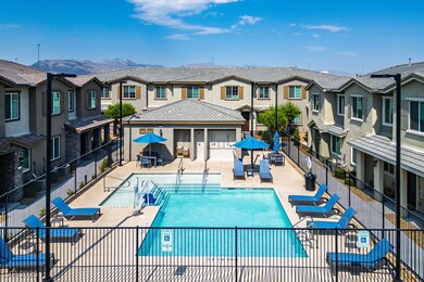 Community pool featuring a residential view, a mou