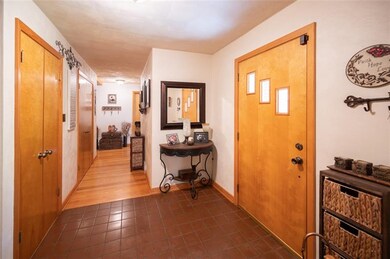 A Spacious, 16x7, Tiled Entry and Lots of Storage/
