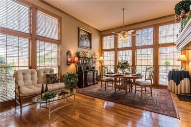 Hearthroom has soaring windows and fireplace (just