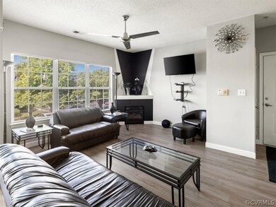 The family room is open to the kitchen and feature