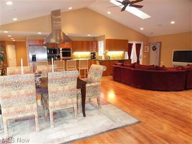 Wide open floor plan with vaulted ceiling soaring 