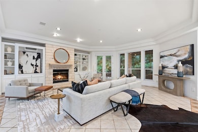 Living area featuring light tile patterned floori