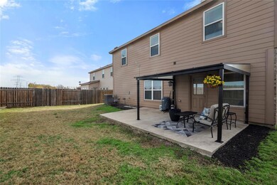 Extended patio with large yard