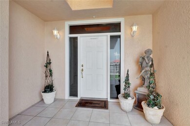 Property entrance with stucco siding