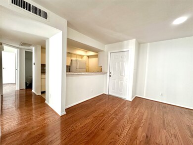 large dining area and hallway to the bedrooms