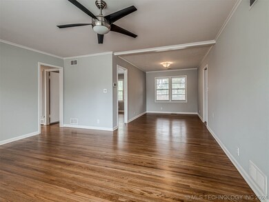 Living room with view of combo dining room