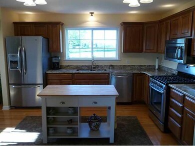 Kitchen Center island is portable but included for