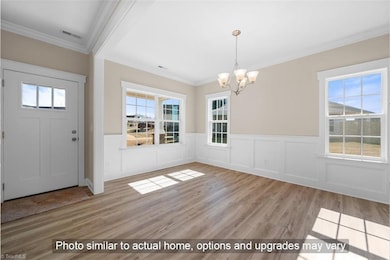 Picture Shows Formal Dining Room - This Home has Home Office