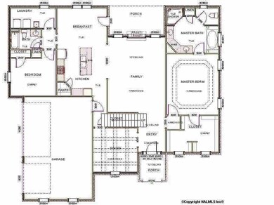 Combination of soft living and classic elegance. Formal dining features beautiful coffered ceilings, wainscoting and hand scraped hardwood flooring.