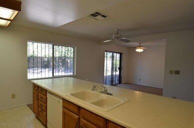 Kitchen to fam rm