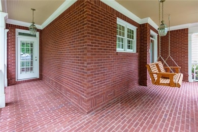 Wrap around from porch with main entrance and entr