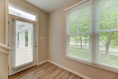 French door entry with a transom window above. Not
