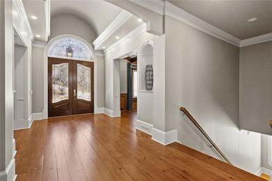 Foyer with view to terrace level stairway