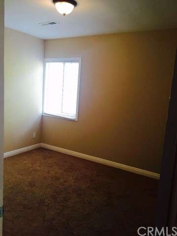 Bedroom 1 of 4 (9' x 9'), with bright natural ligh