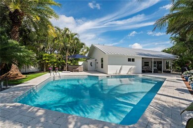 View of pool featuring a fenced in pool, a patio, 