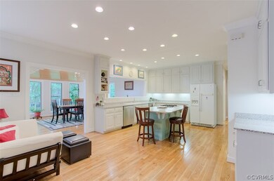 View of flow from kitchen into dining area. note t