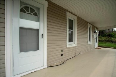 Another view of the covered front porch and new li