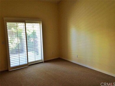 Master bedroom has plantation shutters on sliding 